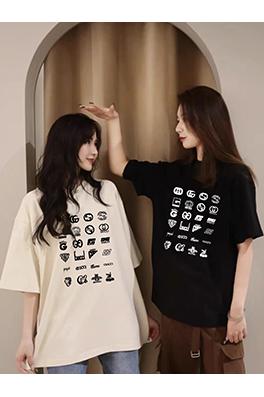 グッチ総柄ロゴカップル用ゆったりクルーネック半袖Tシャツ