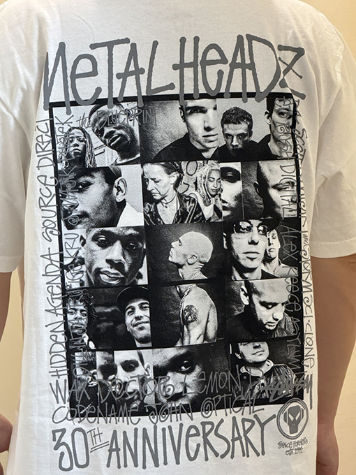 ステューシー3M反射ブラックバンドキャラクターTシャツ