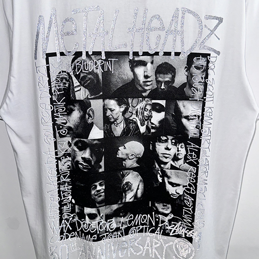 ステューシー3M反射ブラックバンドキャラクターTシャツ