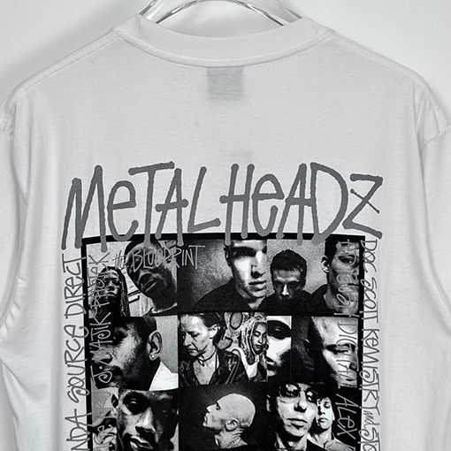 ステューシー3M反射ブラックバンドキャラクターTシャツ