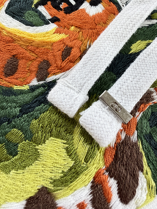 ディオール コラボレーション刺繍入りパーカー