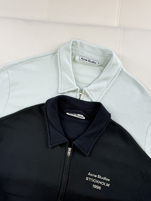 アクネストゥディオズ Acne Studios ヴィンテージ風のダメージマイクロロゴプリントのラペルジップアップジャケット